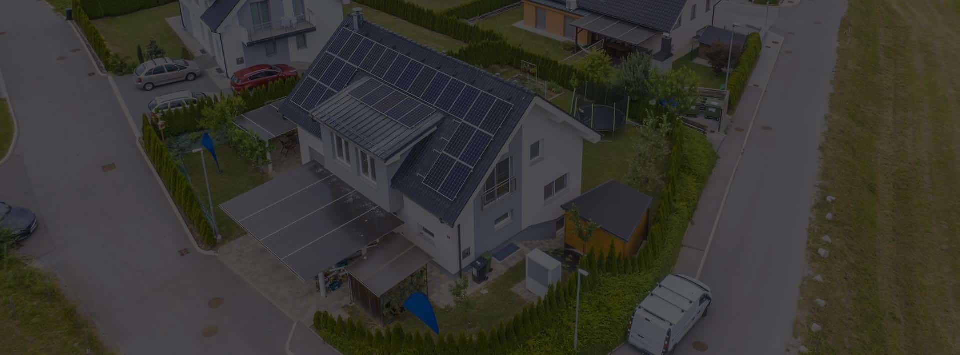 residential house with solar panels and ev charger